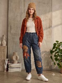 High-Waist Elastic Jogger-Style Patchwork Graphic Jeans High-Waist Elastic Jogger-Style Patchwork Graphic Jeans
